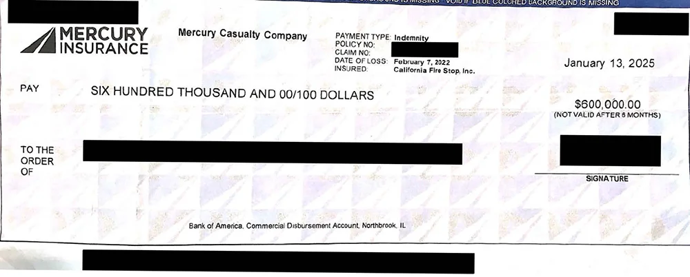 A settlement check for $600,000