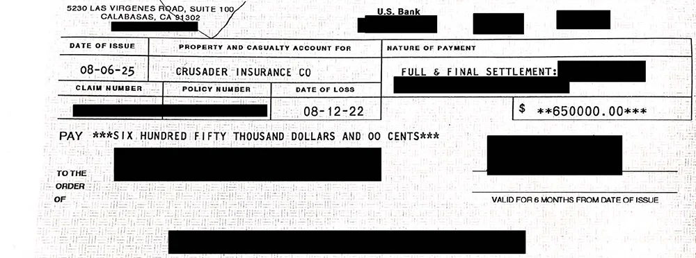 A settlement check for $650,000
