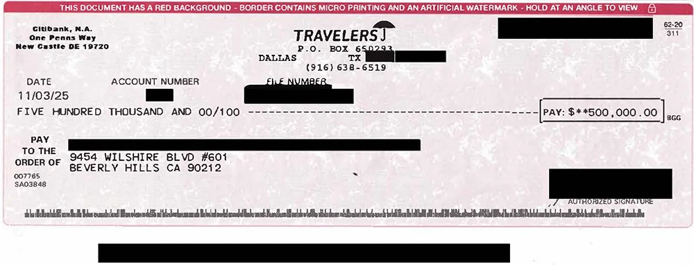 Redacted settlement check issued by Travelers Insurance for $500,000, displayed as part of California Attorney Group’s personal injury case results.