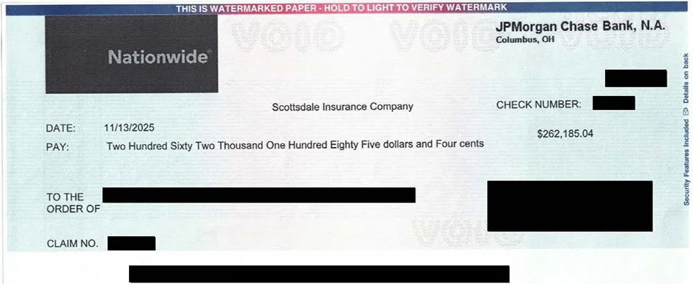 Redacted $262,185.04 personal injury settlement check issued by Nationwide Insurance, displayed as part of California Attorney Group’s California injury case results.