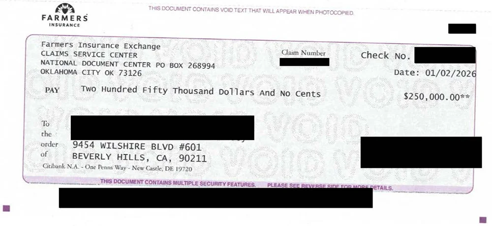 Redacted $250,000 personal injury settlement check issued by Farmers Insurance, displayed as part of California Attorney Group’s California injury case results.