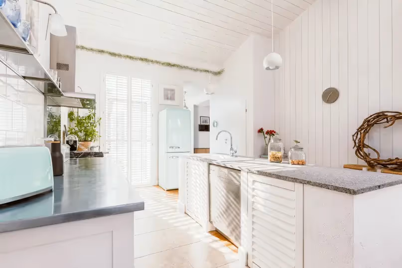 a bright white modern farmhouse kitchen