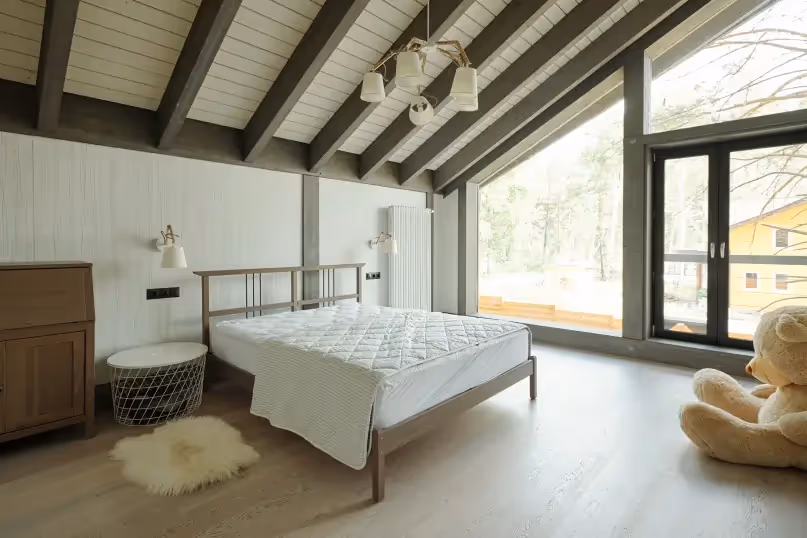 cozy modern farmhouse bedroom with large window