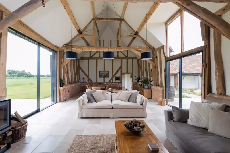 an airy open living room in a modern farmhouse