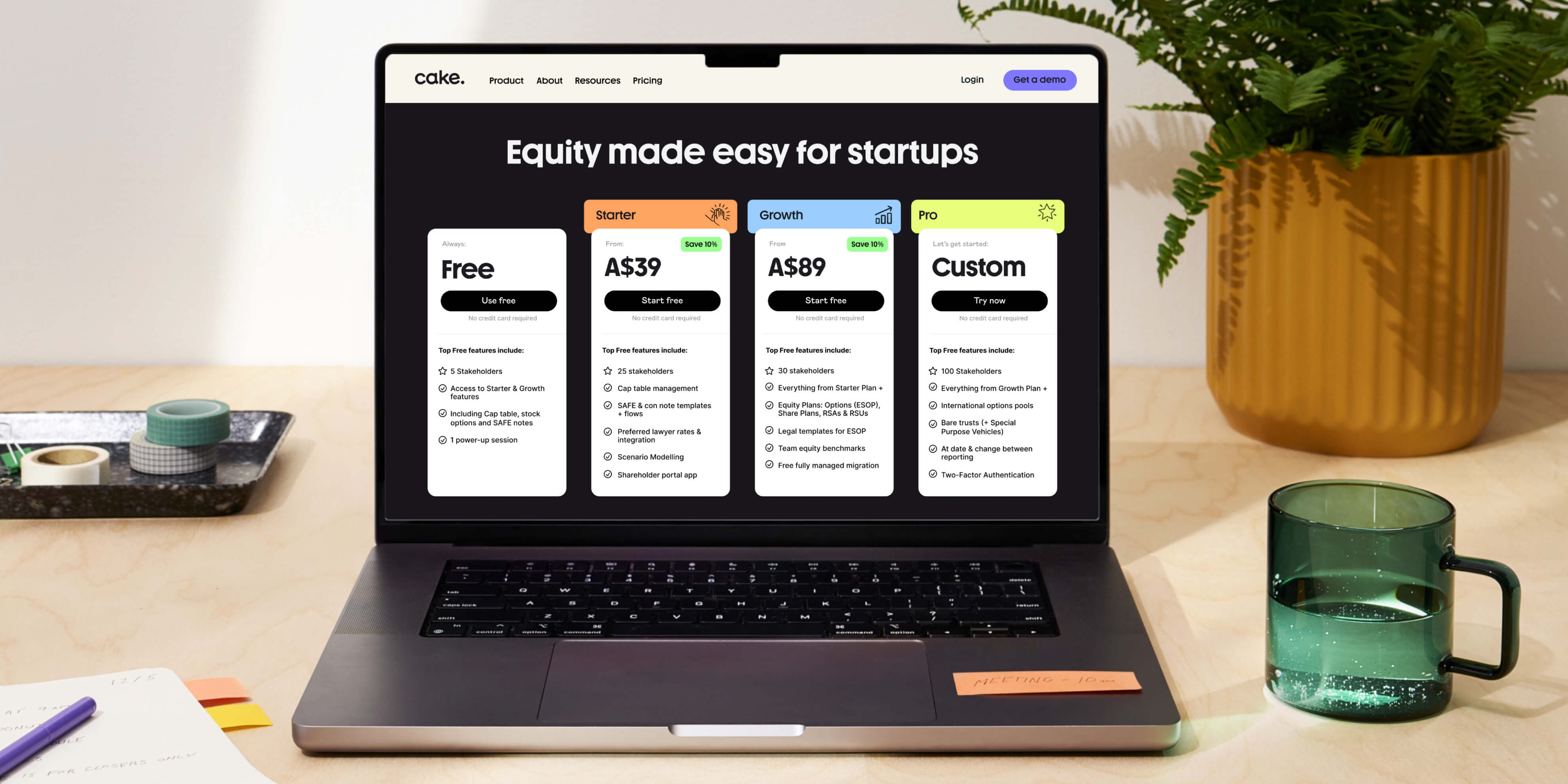 Cake product shown on a MacBook, with the refreshed identity applied across the web app