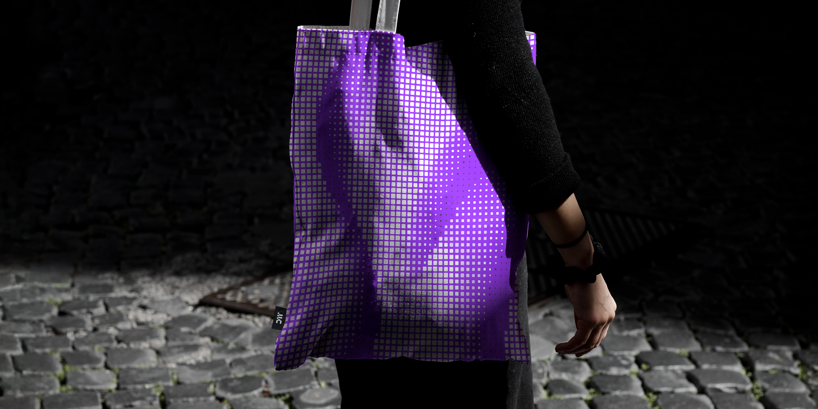 Dataweavers-branded tote bag featuring the DW lettermark for symposium merchandise