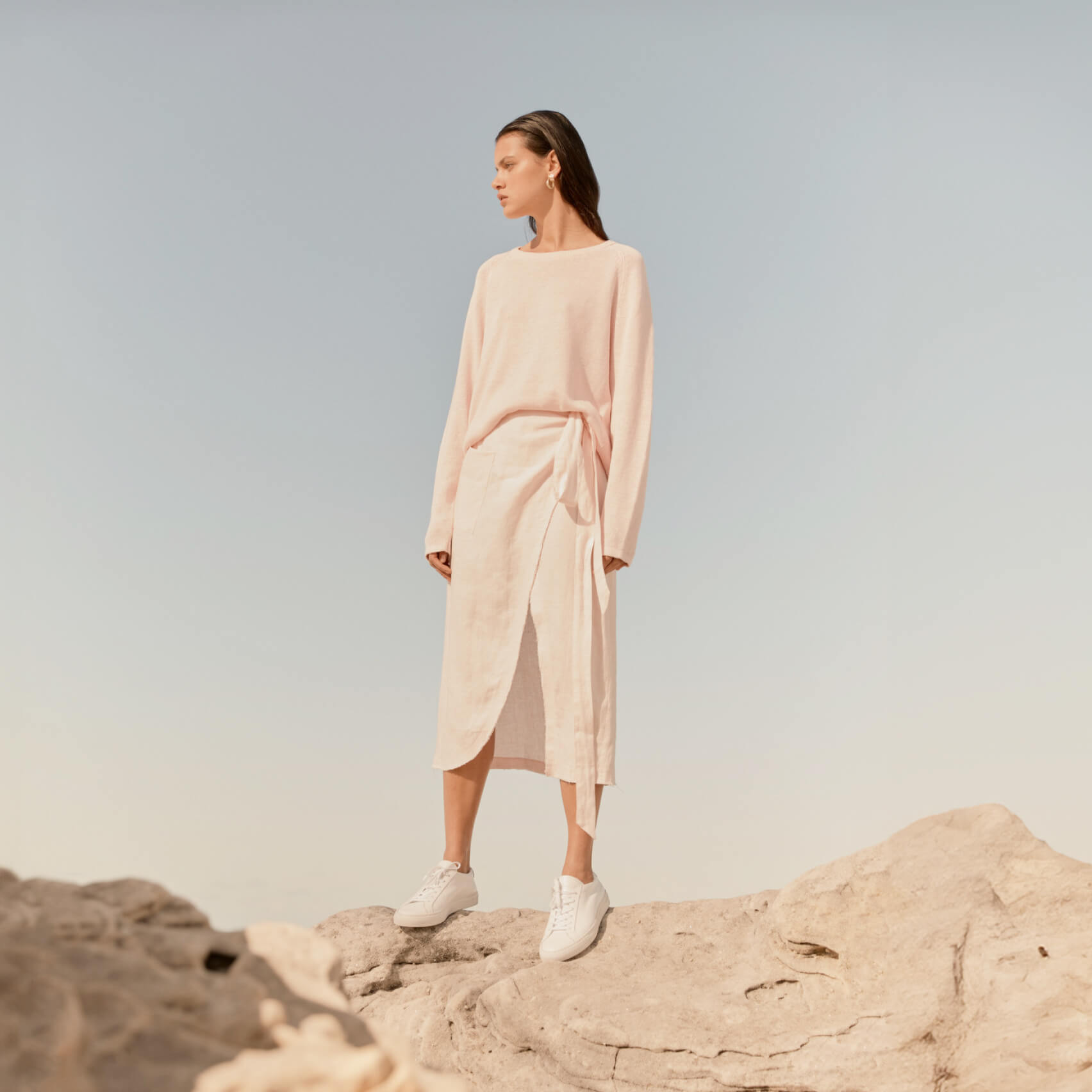 Flagship brand photography treatment showing retail-environment imagery in the refreshed identity