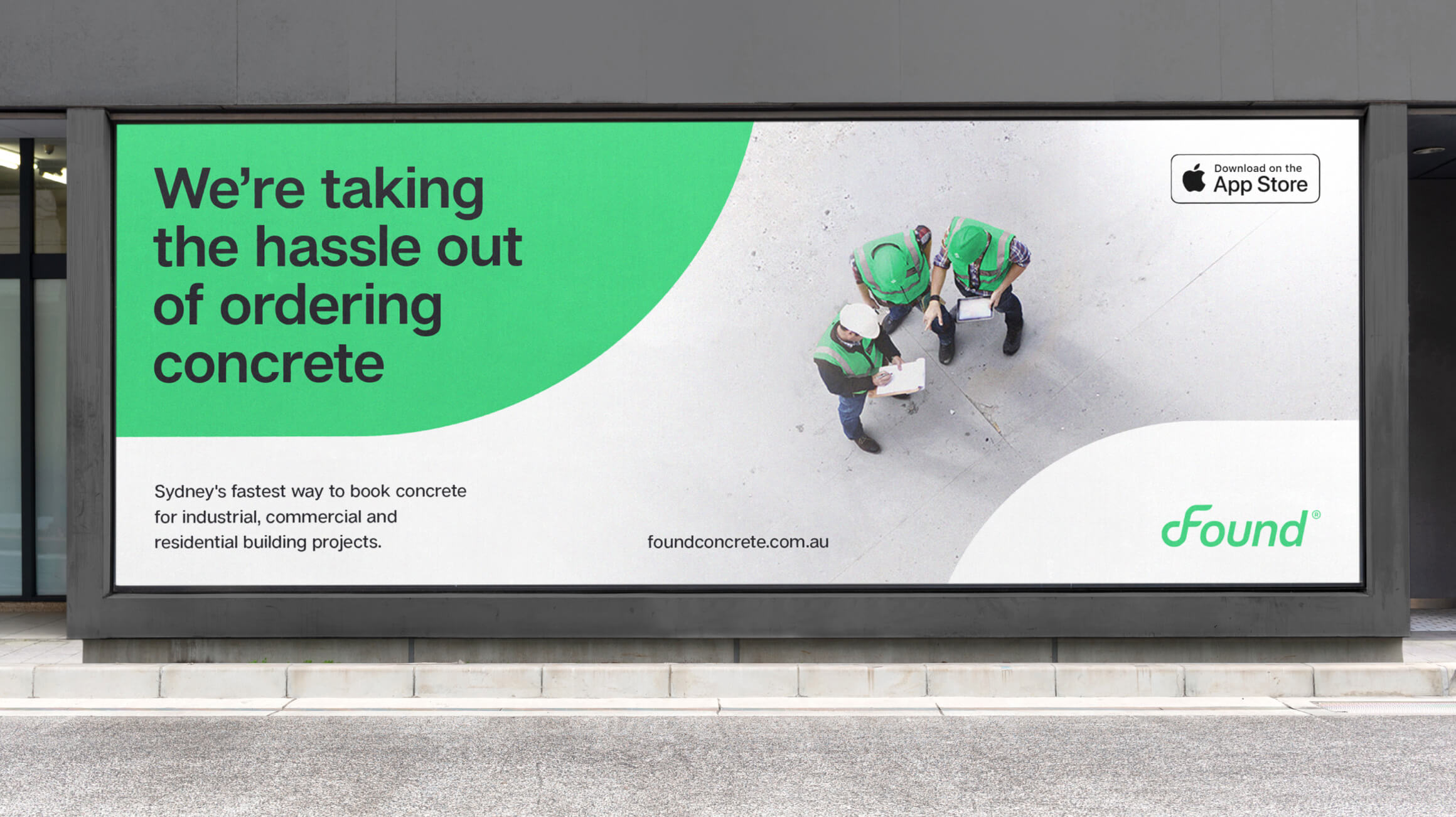 Found outdoor billboard showing the wordmark against the brand bright electric-green palette