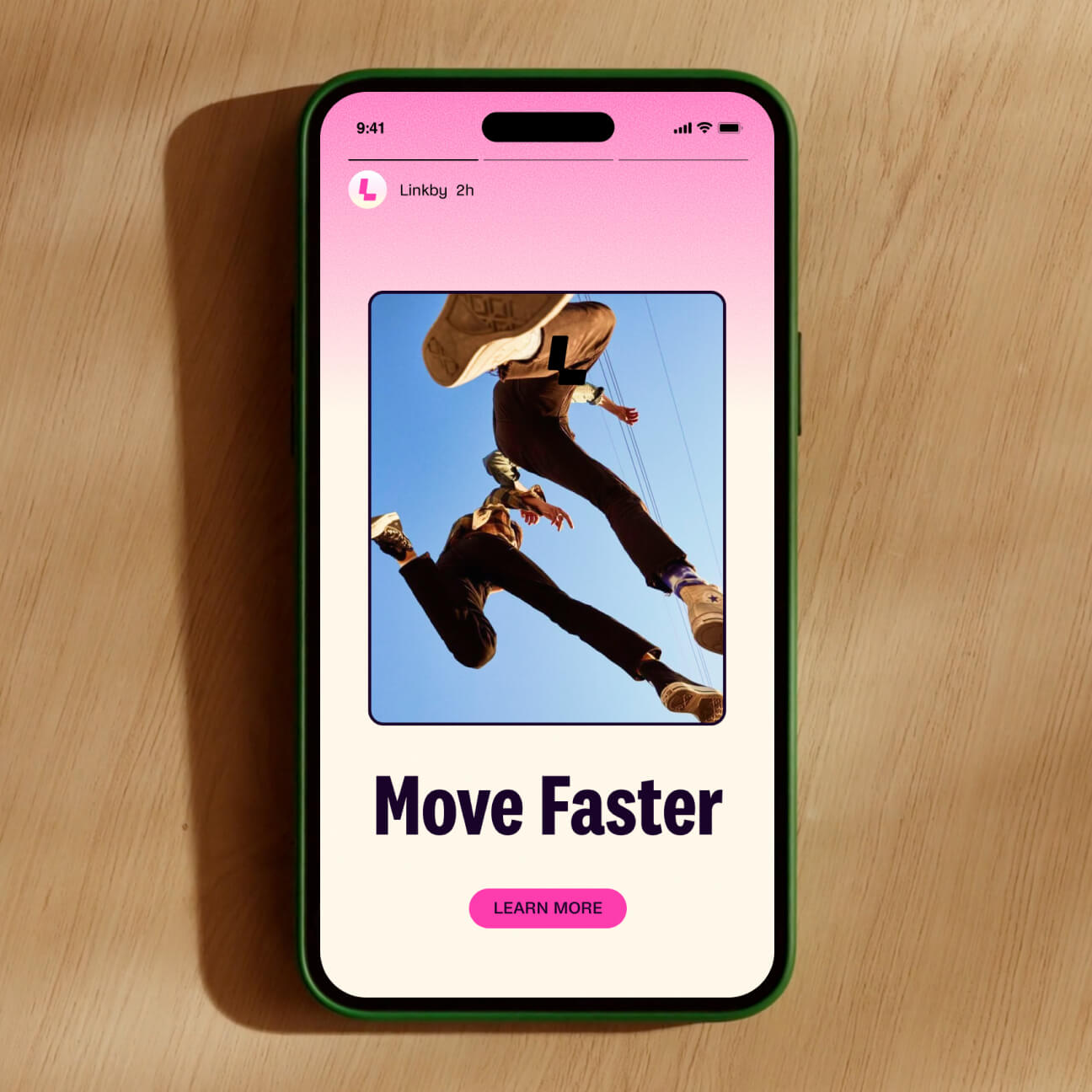 Linkby Instagram feed mockup showing the pink-and-orange brand identity in social context