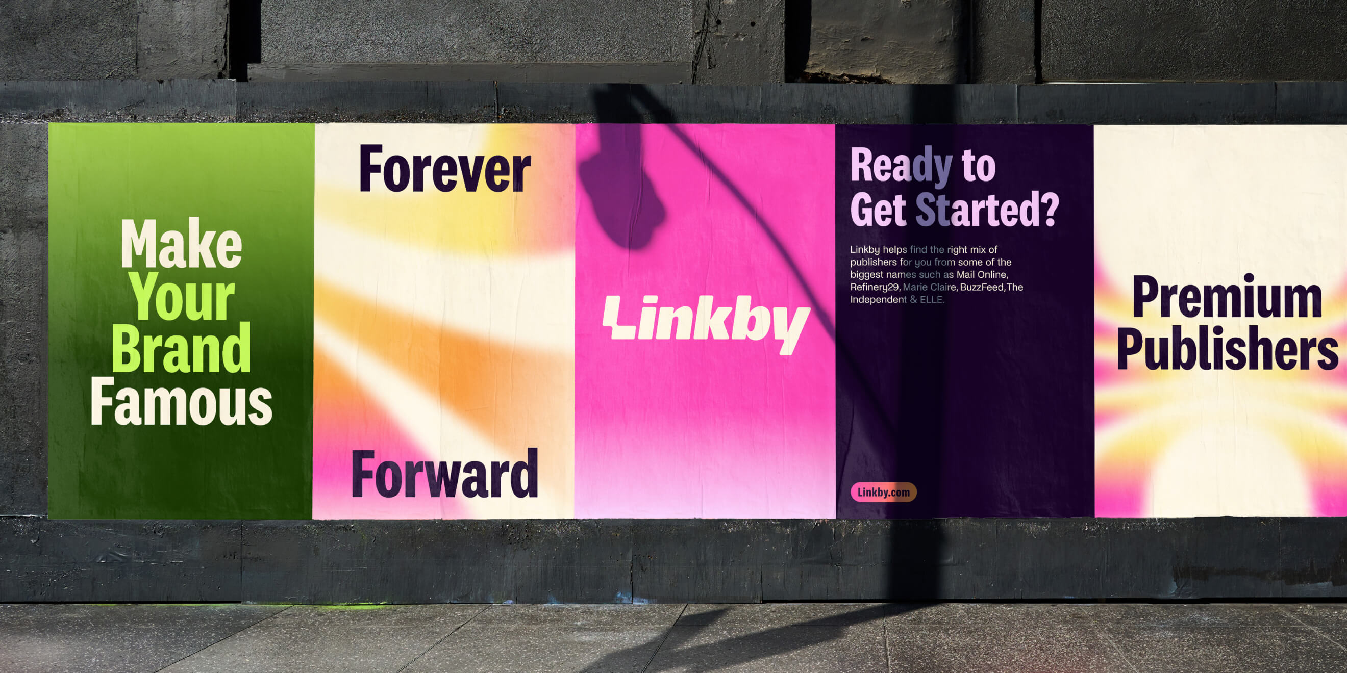 Linkby outdoor paste-up poster showing the refreshed wordmark in high-impact context