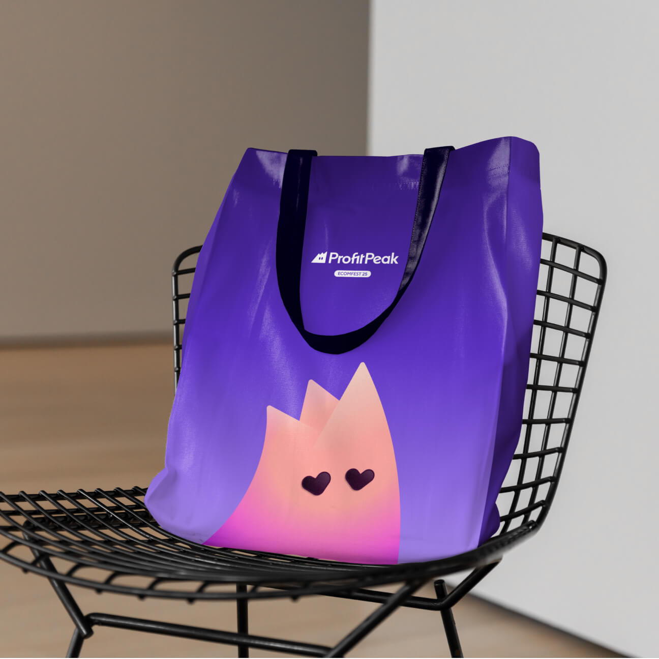 ProfitPeak-branded tote bag showing the mascot and wordmark in the brand warm gradients