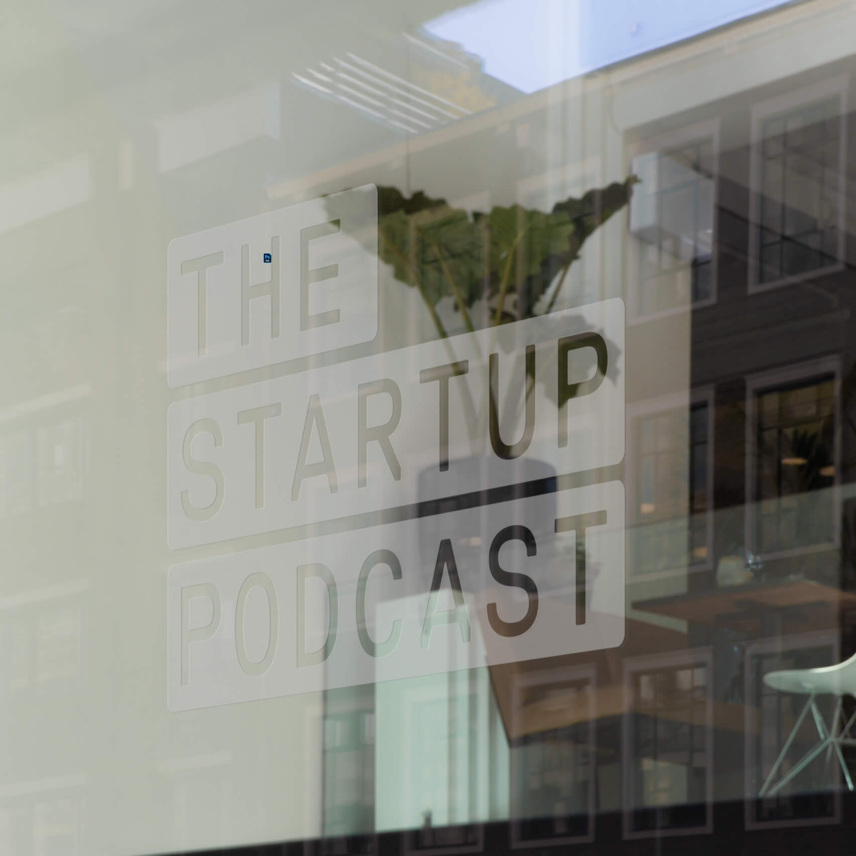 The Startup Podcast window decal showing the wordmark applied to studio signage