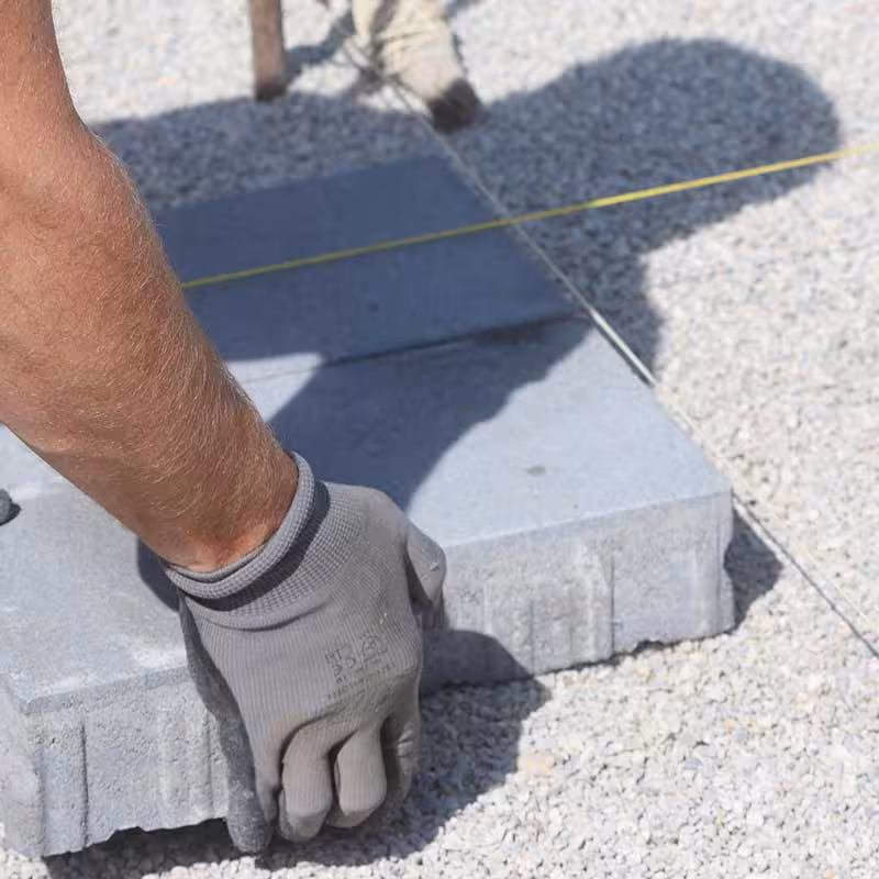 contractor installing pavement