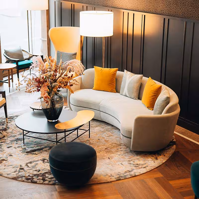 hotel sitting lobby area with large round sofa