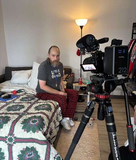 A Happy Productions crew filming an interview in a supporter&rsquo;s home