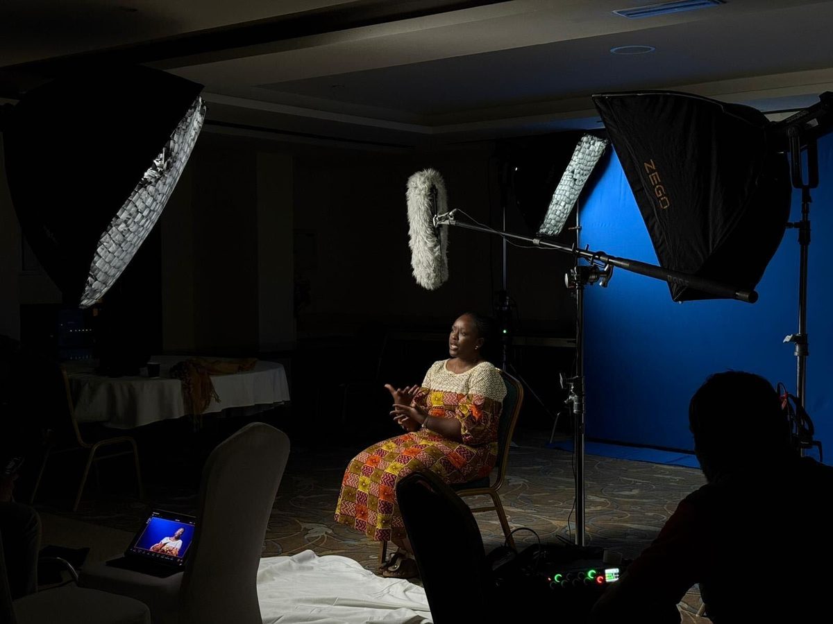 Deep blue backdrop studio look with softbox lighting