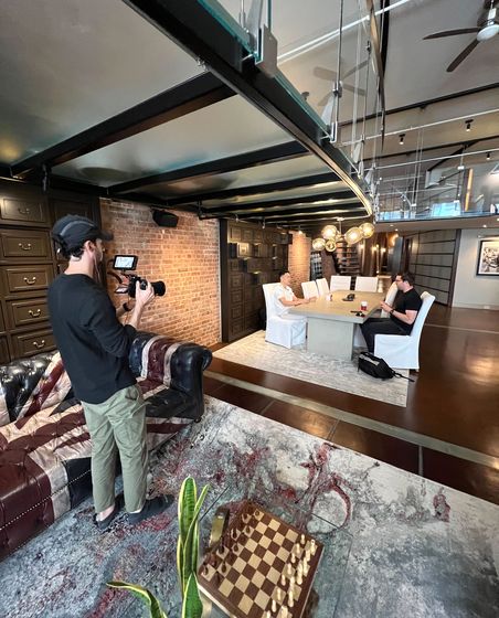 Happy Productions crew on set in a loft