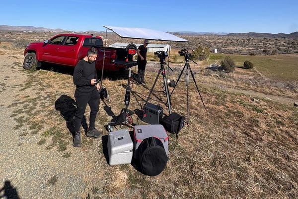 Happy Productions crew setting up an on-location interview on a ranch