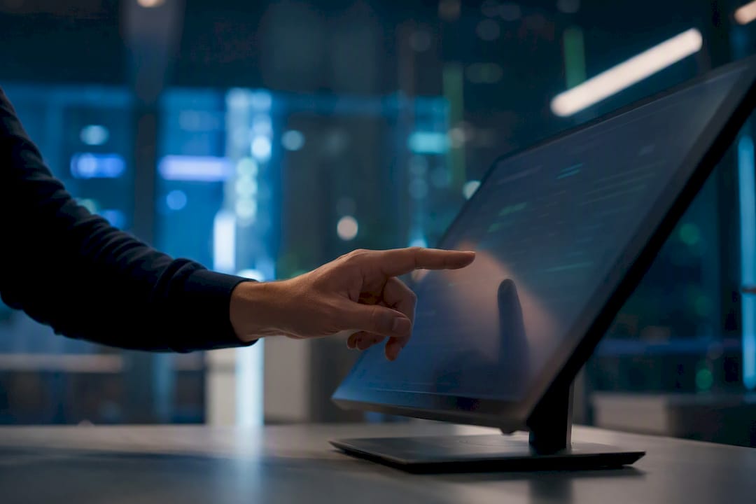 Hand adjusting technical control knob during AI rollout