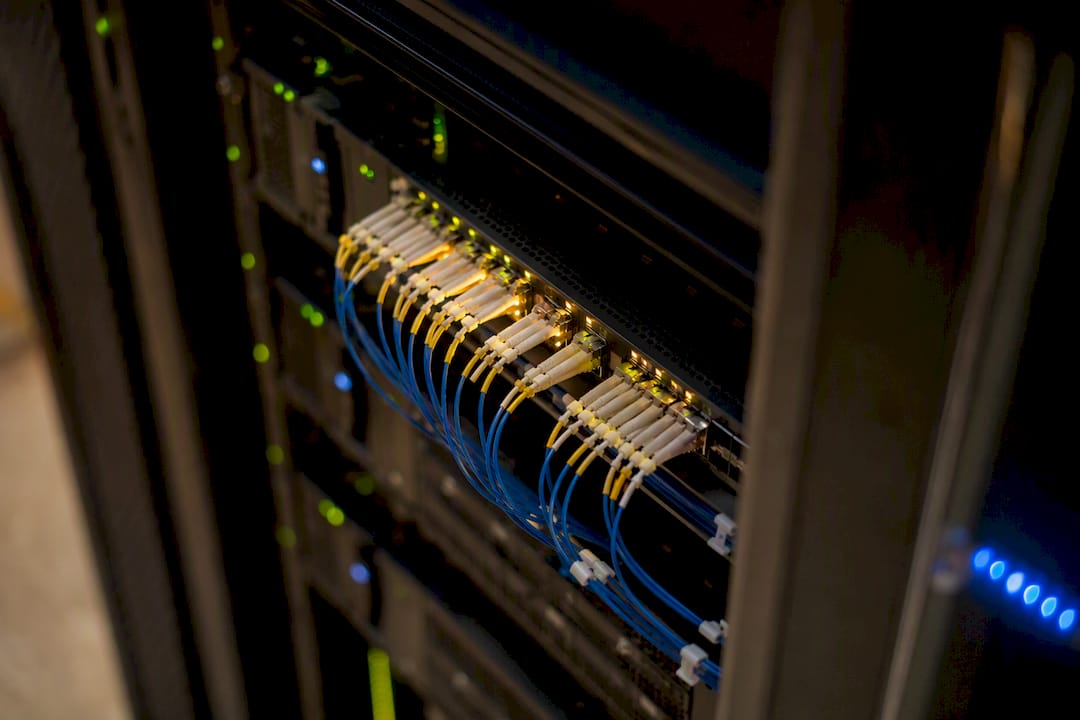 Close-up of fiber optic cables in data center