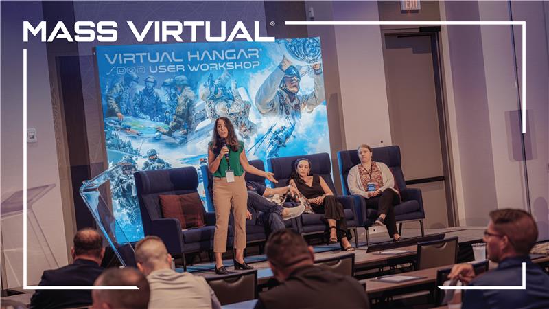 Presenter on stage at a Mass Virtual conference session.