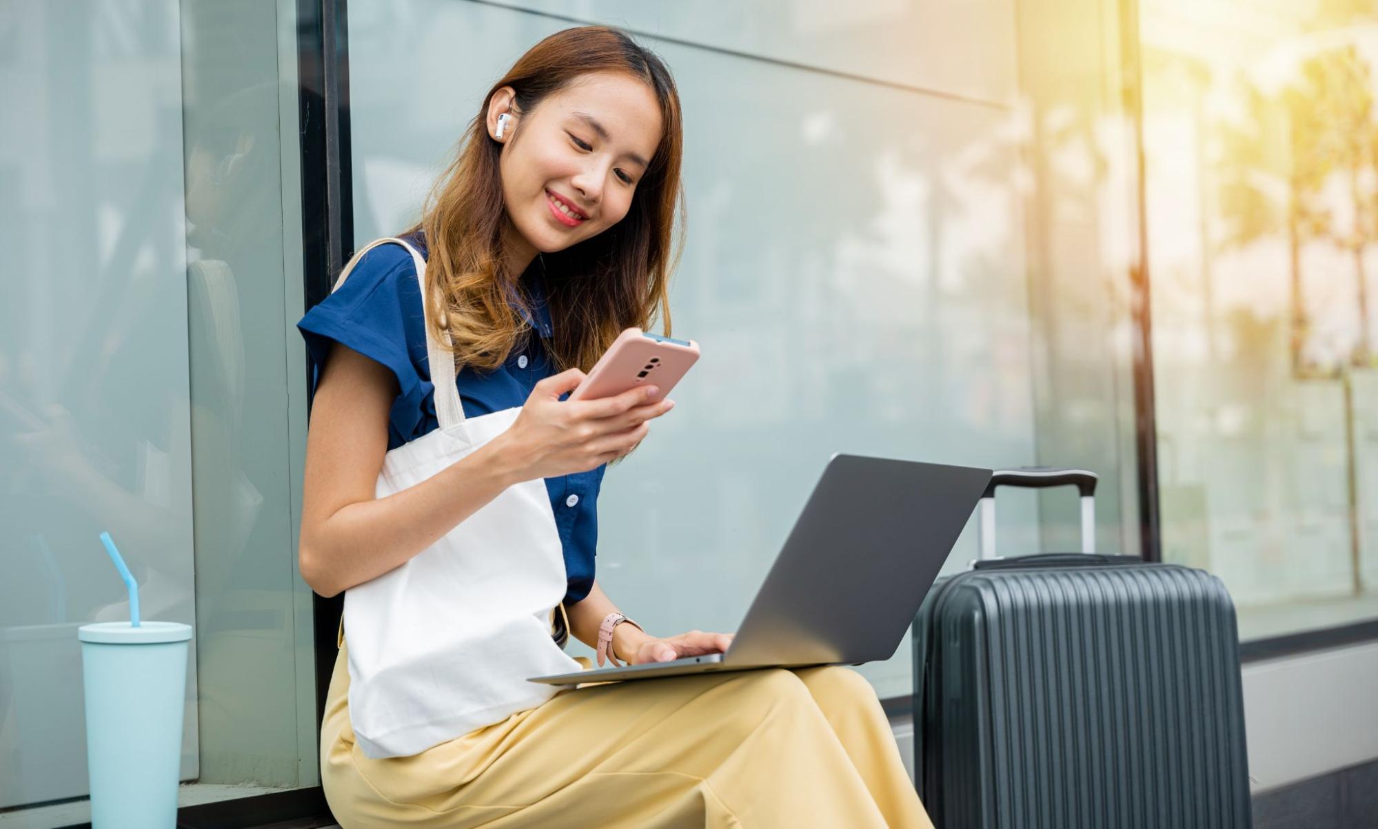 woman traveling and engaging with digital marketing for travel and tourism