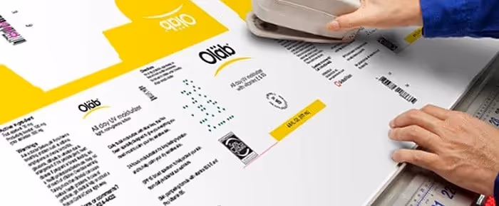 Manually inspecting the print and packaging materials