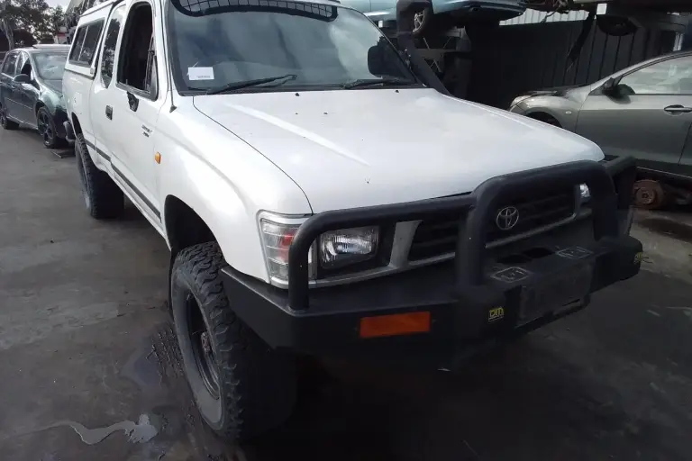 Unregistered white Toyota 4WD at Wreckerland facility prepared for car wrecking and instant cash for cars service in Victoria.