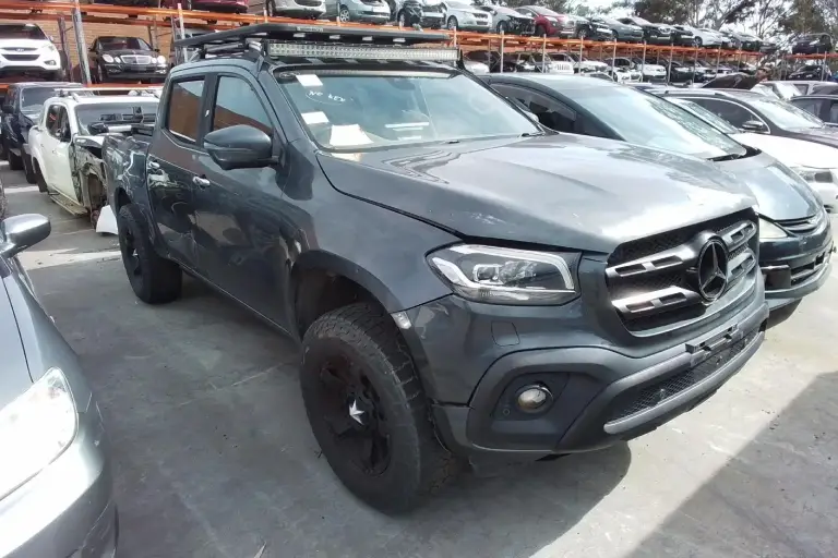 Old Mercedes-Benz ute in Melbourne at a wrecker yard, available to sell fast for cash with free pick-up.