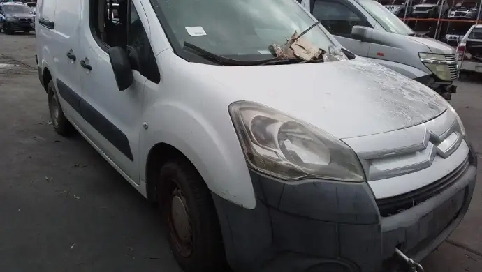 White damaged van with broken windshield awaiting scrap car valuation and instant cash for damaged vehicles service in Melbourne.