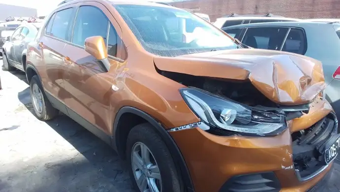 Damaged orange SUV with front-end crash, selling car without a roadworthy certificate in Victoria.