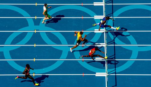 Kerron Clement jumps over a hurdle during the men's 400m hurdles finals at Rio 2016.