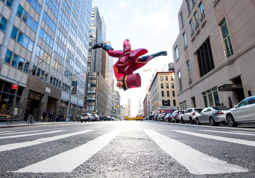 The Nutcracker performs a flip in a crosswalk in New York City