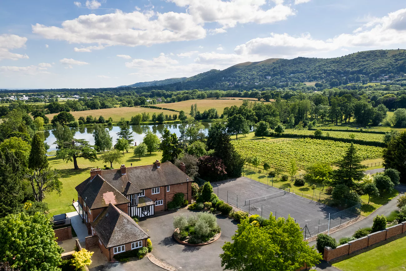 The Lake House with the Malvern Hills in the background
