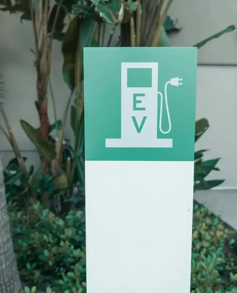 Passenger boarding an electric shuttle using the Flock rider app
