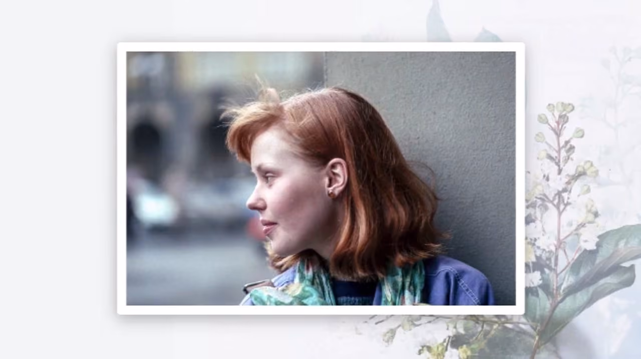 A finished Eulogize tribute video showing a family photograph in a designed frame
