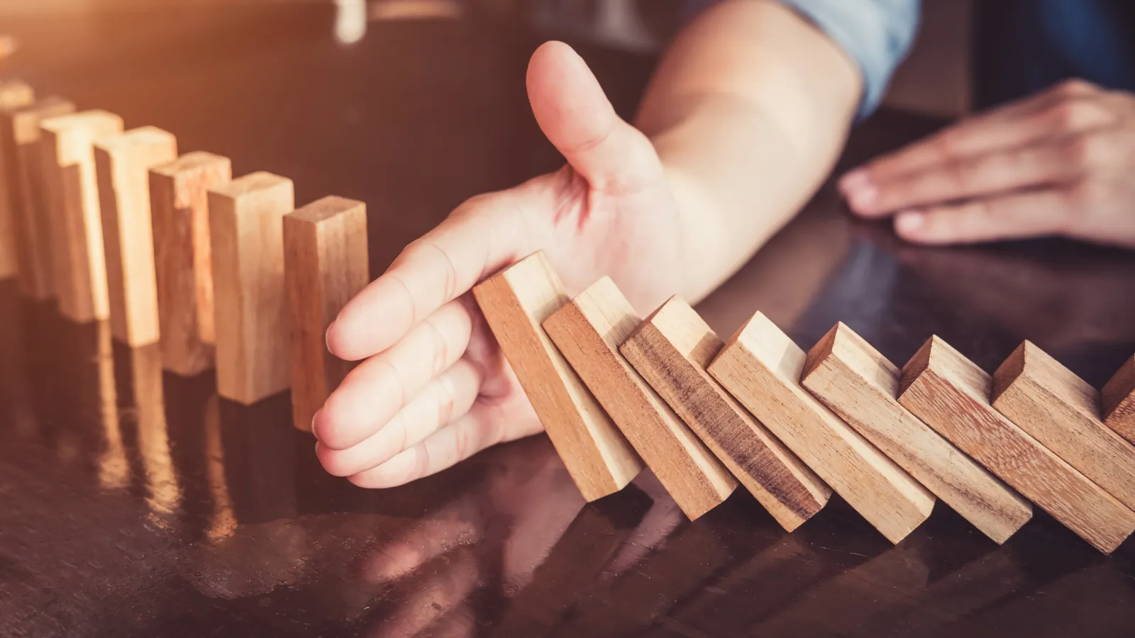 Dominoes falling and stopping