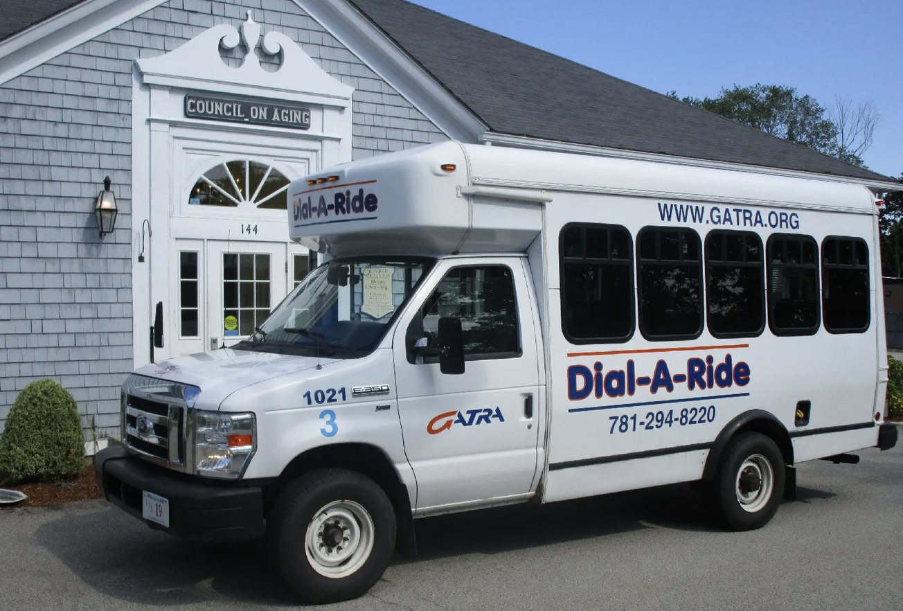GATRA bus parked in front of a building