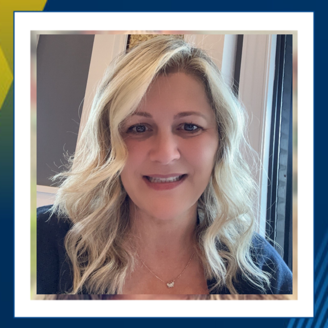 Dr. Denise D'Anna smiling in a professional headshot photo