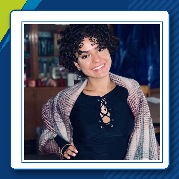 Talia Calero smiling in a staff directory photo