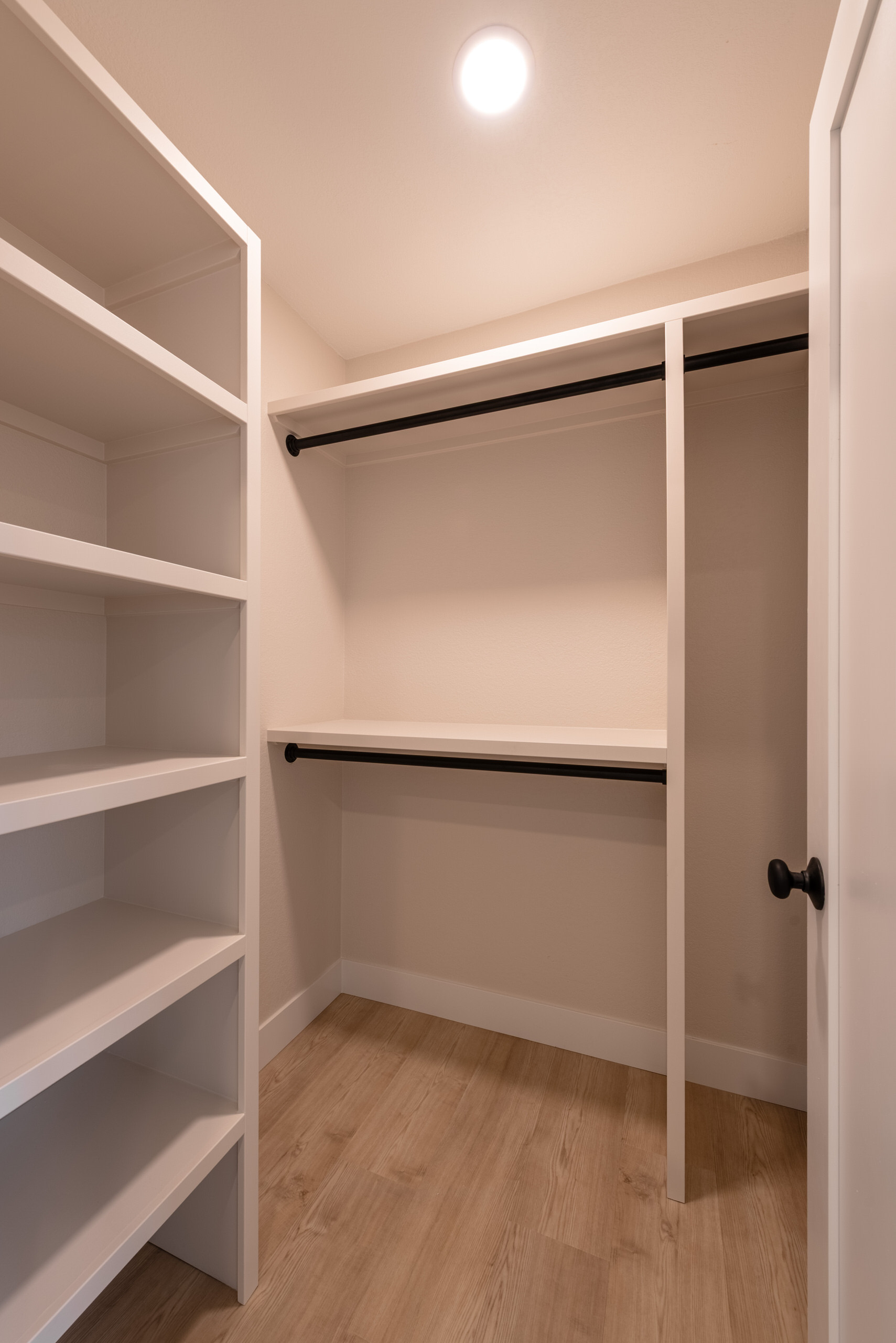 Walk-in closet with custom shelving in custom mother-in-law suite addition, Littleton.