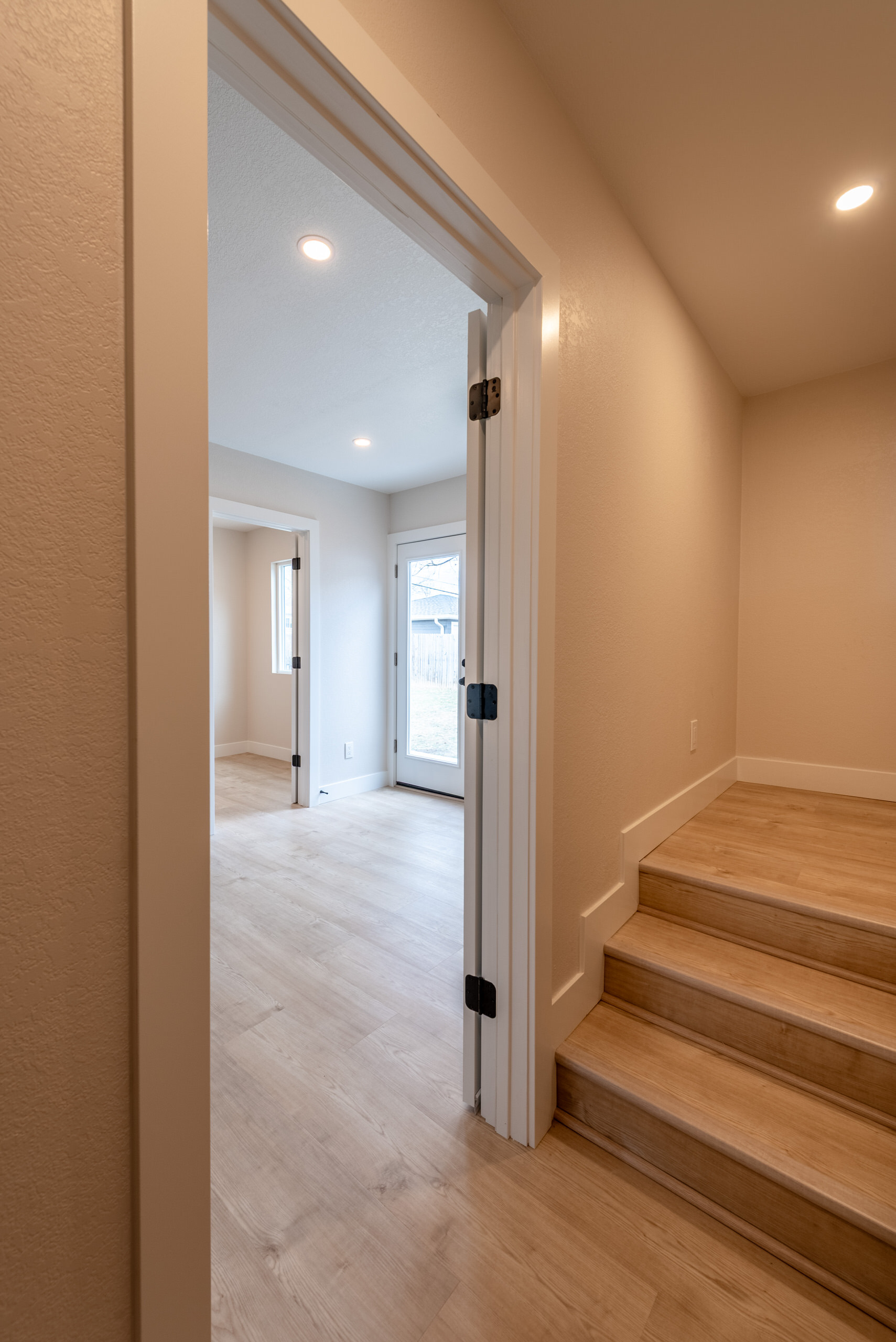 Private entrance stairs in custom mother-in-law suite addition, Littleton.