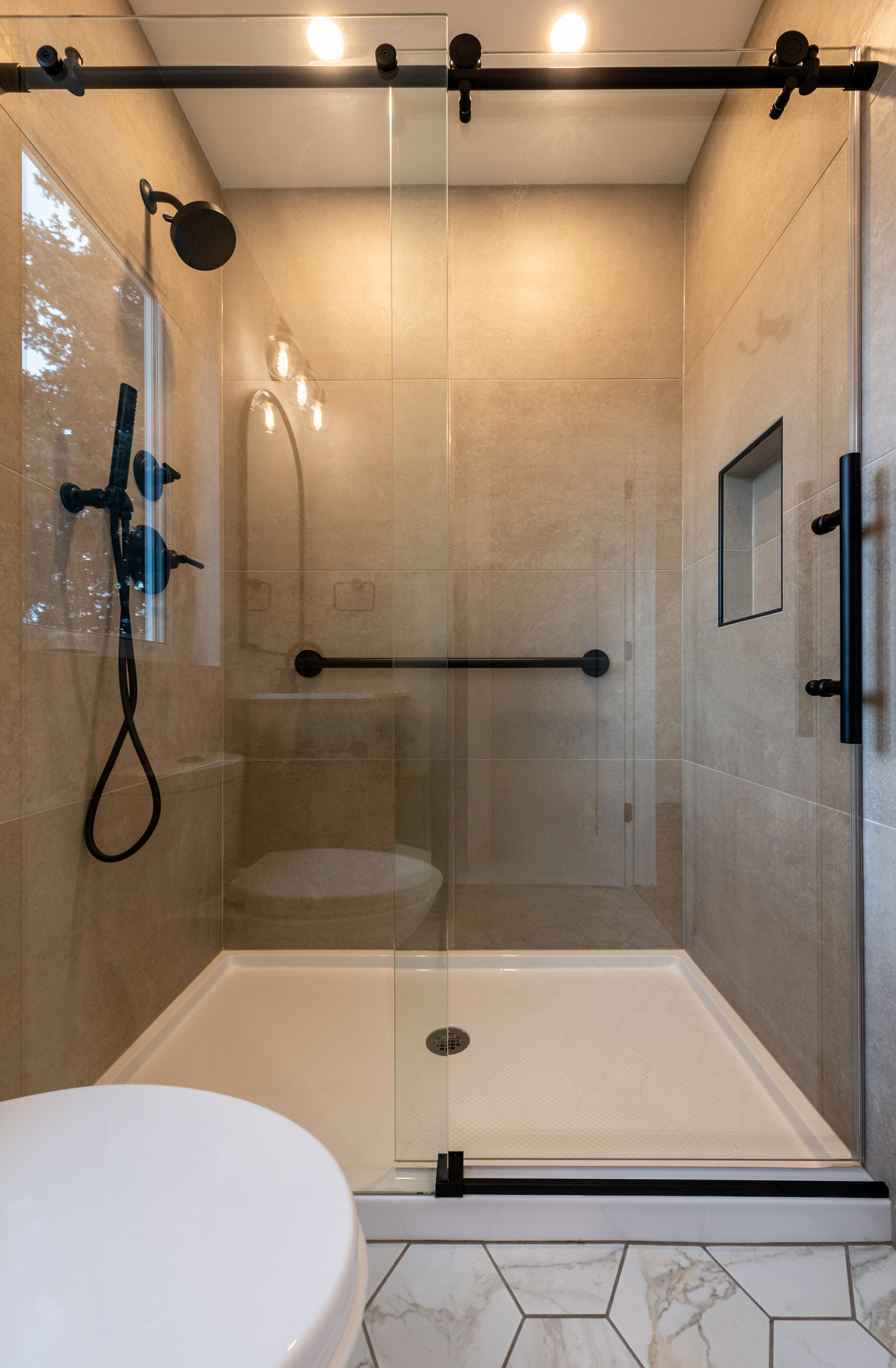 Accessible bathroom fixtures in custom mother-in-law suite addition, Littleton.