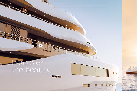 Side view of a large white luxury yacht docked near a harbor at sunrise or sunset.