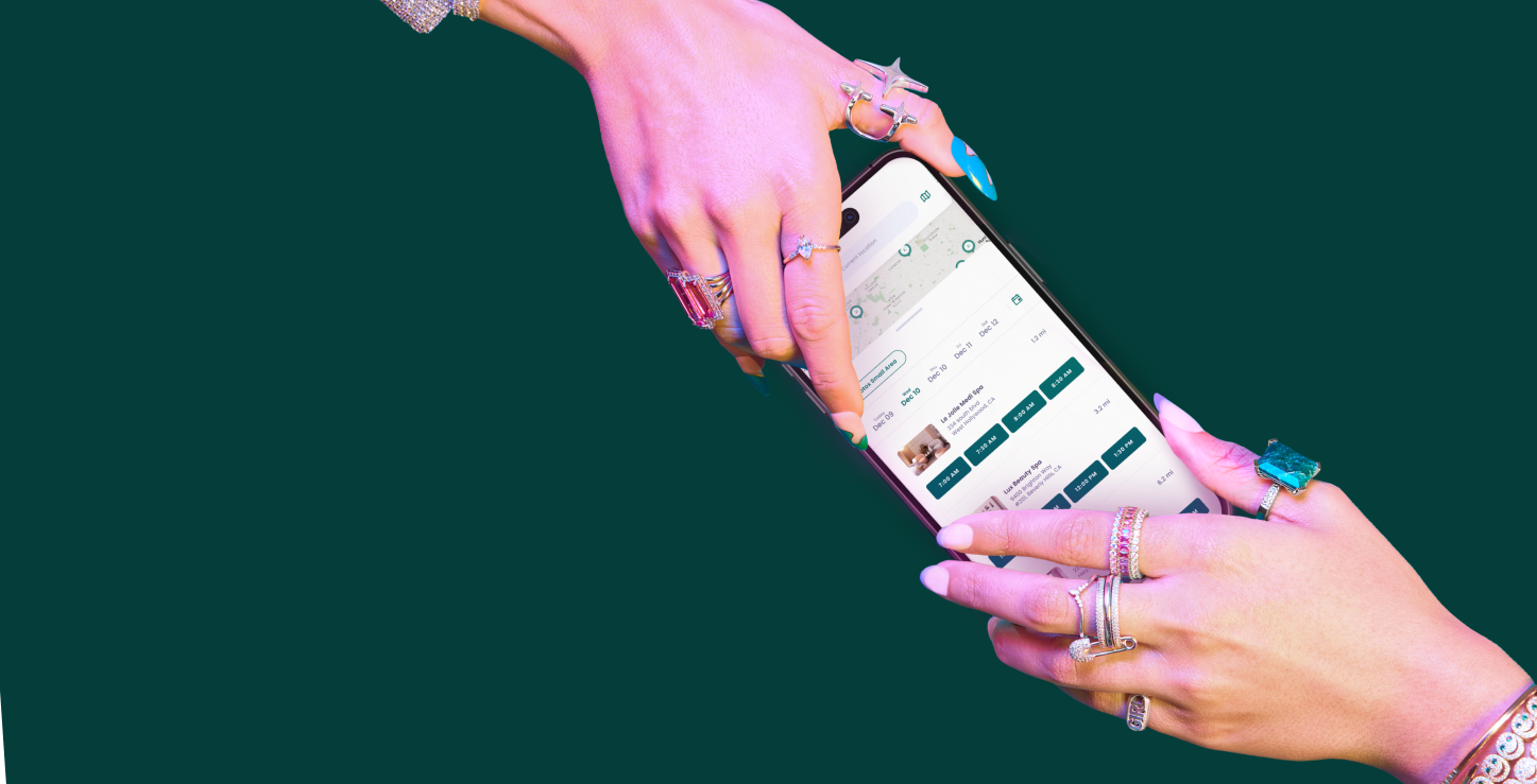 Two hands grabbing phone with upkeep app visible on screen
