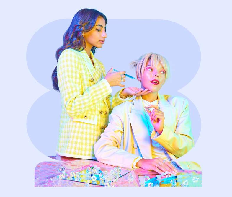 Woman playing with each others hair