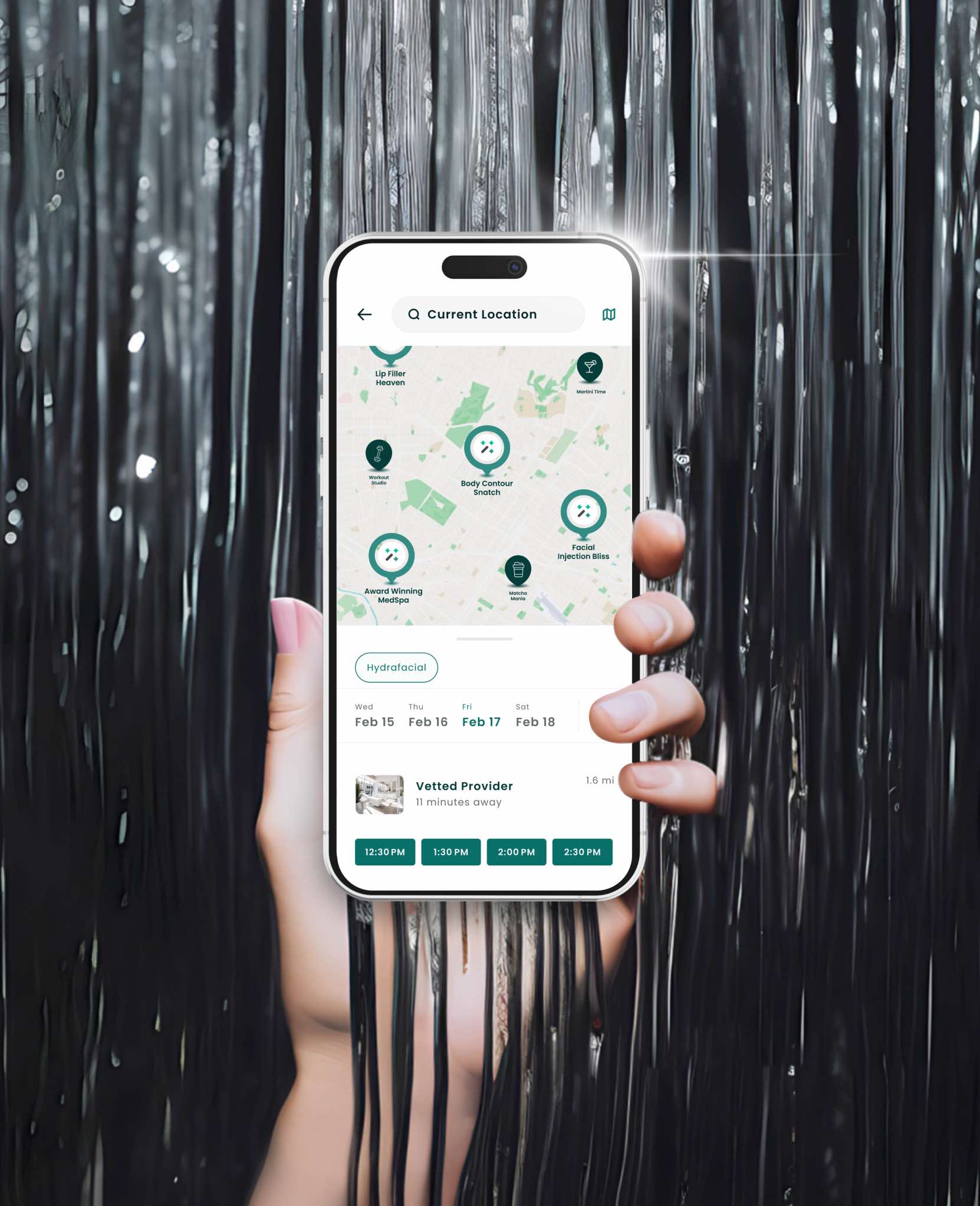 hand holding iphone with Upkeep's app open on booking an appointment
