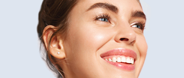 A woman smiling