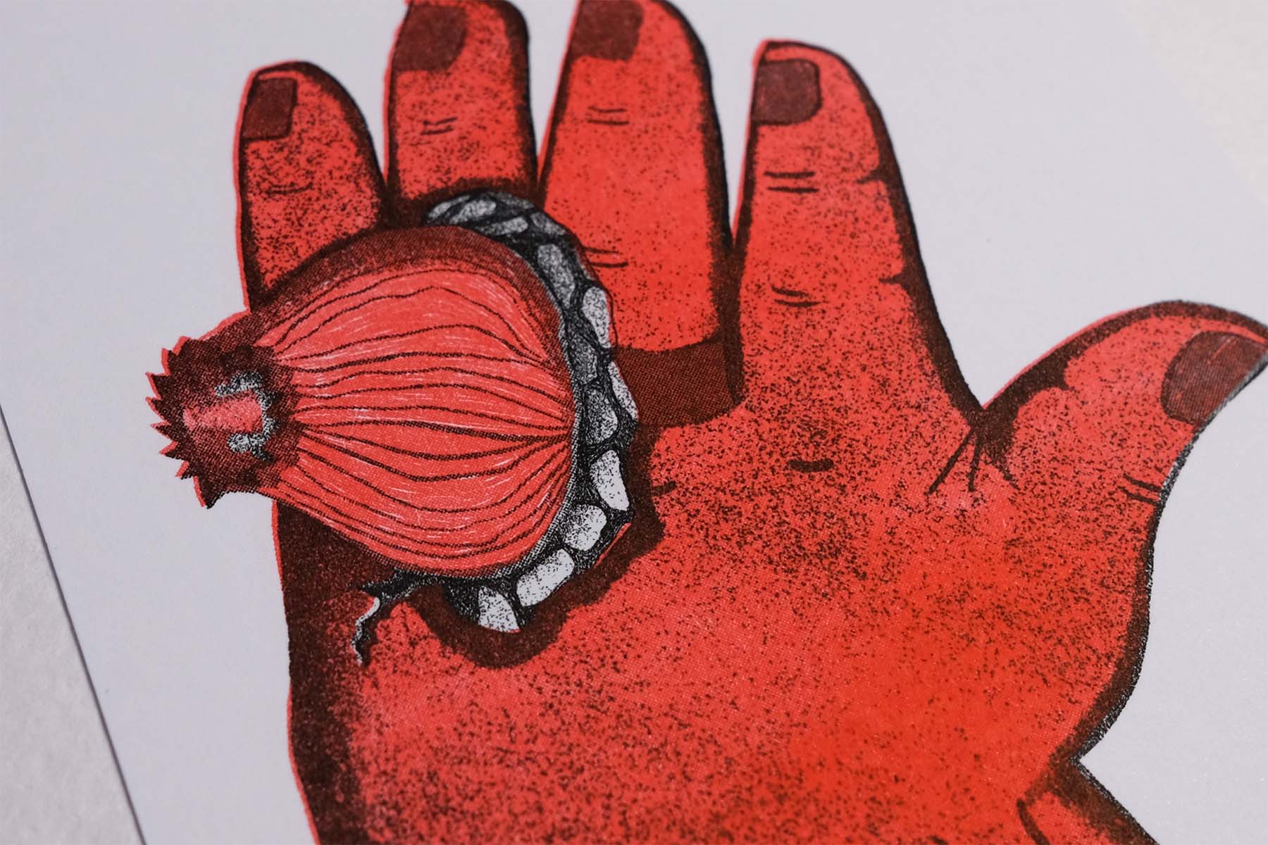 Zoom in of the hand with the magic ring risograph print