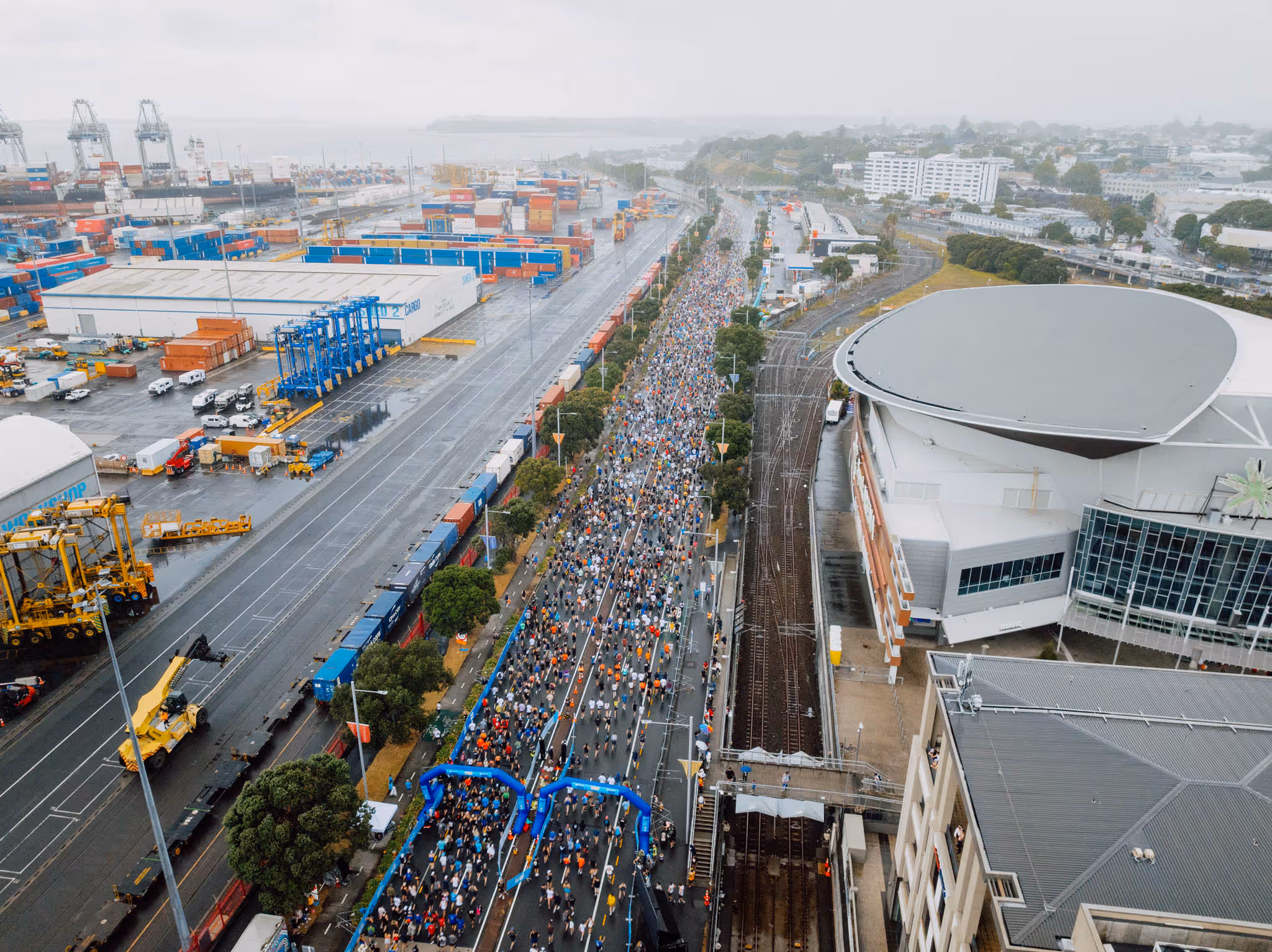 An arial view from the Auckland Round the bays event showing a large number of people making their way down a road